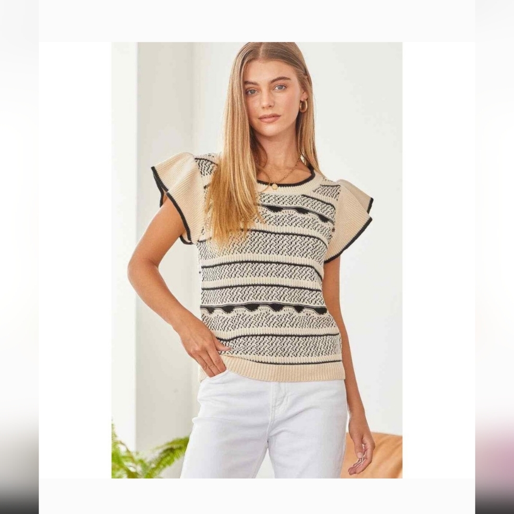 Andree by unit The Indie Black and Cream ruffle blouse